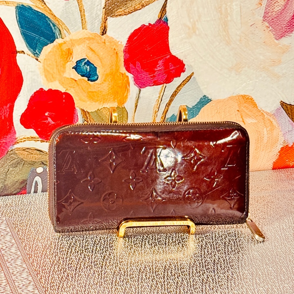 Louis Vuitton Brown Embossed printed monogram zipper round Wallet